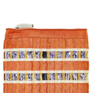 HealthyLine orange textured mat with two horizontal rows of embedded purple amethyst crystals