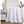 HealthyLine white quilted blanket draped over a white bedside table