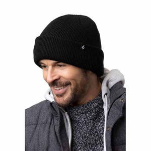 Man wearing a black Heat Holders ribbed beanie hat