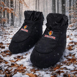 Black Heater Body Suit insulated boot covers on snowy forest ground