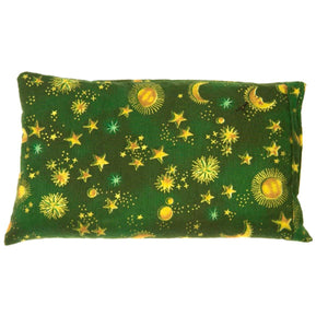 Heaven's Therapy rectangular eye pillow with green fabric featuring yellow suns moons and stars
