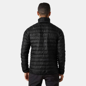 Back view of a person wearing a black Helly Hansen quilted puffer jacket