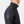 Helly Hansen black quilted jacket with high collar and HH logo on sleeve