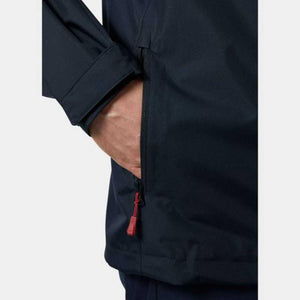 Close up of a Helly Hansen jacket side pocket with a red zipper pull