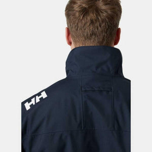 Back view of Helly Hansen navy jacket with HH logo on shoulder