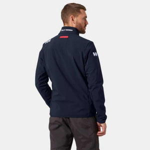 Back view of a man wearing a navy Helly Hansen softshell jacket with white branding