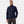 Man wearing a navy Helly Hansen softshell jacket with a full zip and chest pocket
