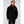 Man wearing a black Helly Hansen rain jacket with HH logo