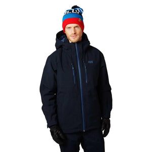 Man wearing a Helly Hansen navy ski jacket and a multi-colored knit beanie