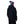 Person wearing a navy Helly Hansen hooded jacket and a blue red and white pom pom beanie