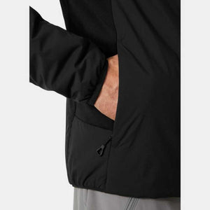 Close up of hand in pocket of black Helly Hansen jacket