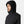 Man wearing a black Helly Hansen hooded jacket with HH logo