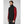 Man wearing a black Helly Hansen softshell vest over a red long sleeve shirt