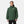 Man wearing a green Helly Hansen hooded zip up jacket with white logo