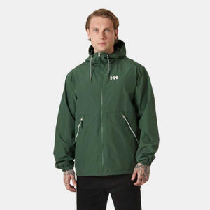 Man wearing a green Helly Hansen hooded zip up jacket with white logo