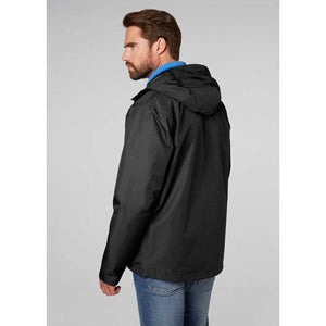 Man wearing a black Helly Hansen hooded rain jacket seen from the side
