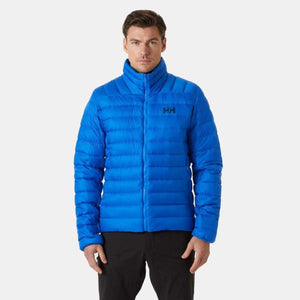 Man wearing a blue Helly Hansen puffer jacket with a high collar and HH logo on the chest