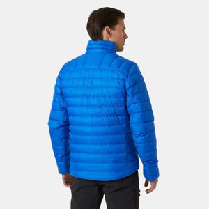Back view of a man wearing a blue quilted down jacket