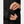 Close up of hands adjusting the velcro cuff on a black jacket