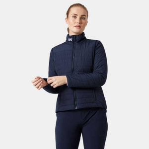 Woman wearing a navy Helly Hansen quilted jacket with a high collar