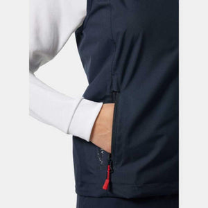 Close up of navy Helly Hansen vest pocket with red zipper pull