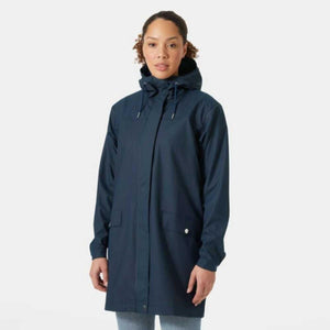 Woman wearing a navy blue Helly Hansen hooded rain jacket