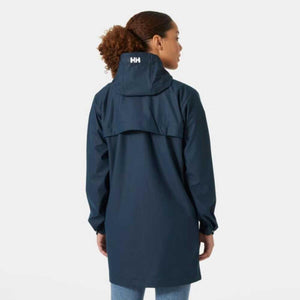 Back view of a person wearing a navy Helly Hansen raincoat with a hood