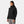 Woman wearing a black Helly Hansen hooded jacket