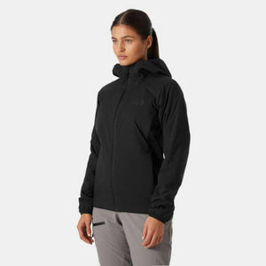 Woman wearing a black Helly Hansen hooded jacket