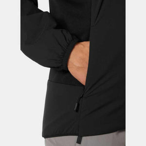 Close up of Helly Hansen black jacket pocket with hand inside