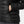 Close up of Helly Hansen black quilted puffer jacket side pocket