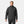 Man wearing a black Helly Hansen hooded rain jacket