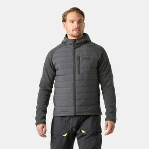 Man wearing a dark grey Helly Hansen hooded hybrid jacket with quilted front and knit sleeves
