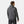 Back view of a man wearing a grey Helly Hansen hooded hybrid jacket with quilted panels