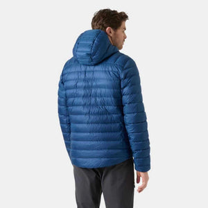 Back view of a man wearing a blue Helly Hansen hooded down jacket