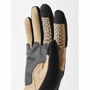 Hestra tan and black cycling glove with textured palm and finger grip detailing