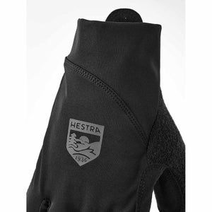 Black Hestra glove with brand logo patch