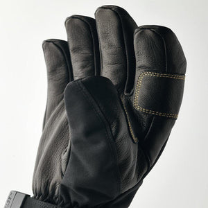 Hestra black leather glove with yellow stitching detail