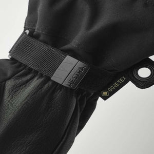 Black Hestra glove wrist strap with Gore-Tex branding