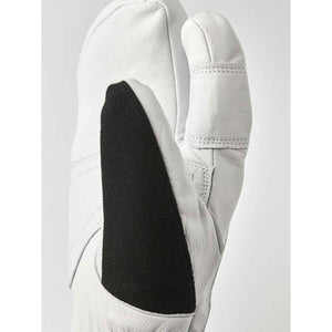 White leather mitten with black textured palm patch