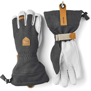 Hestra grey and white leather ski gloves with adjustable wrist straps and Hestra logo patch