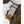 Hestra glove wrist strap detail with white leather and olive green fabric