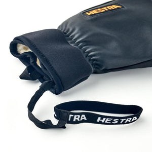 Black Hestra glove with wrist strap and fleece lining