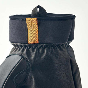Close up of Hestra black leather glove cuff with orange pull tab