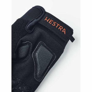 Hestra black glove with reinforced palm and wrist strap