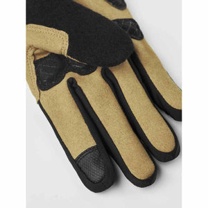 Hestra tan and black suede gloves with textured finger tips