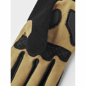 Hestra tan and black suede glove with textured grip detailing