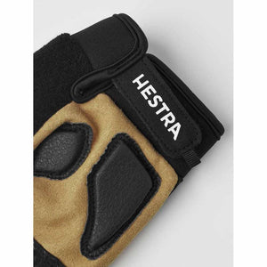 Hestra glove palm detail with black leather padding and velcro wrist strap