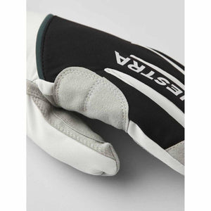 Close up of Hestra glove with black fabric and grey suede palm reinforcement