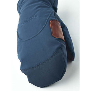 Hestra navy blue mitten with brown leather thumb detail